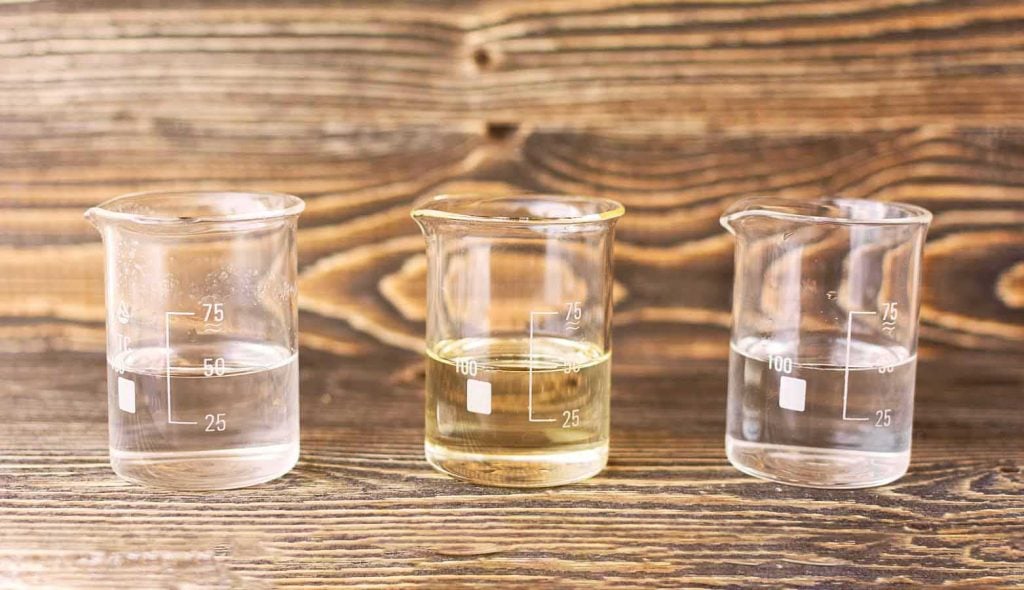 Two experimental glasses with the same capacity and amount of liquid