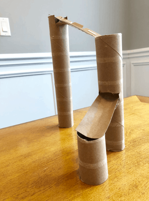 Marble maze run made using empty paper towel and toilet paper rolls.