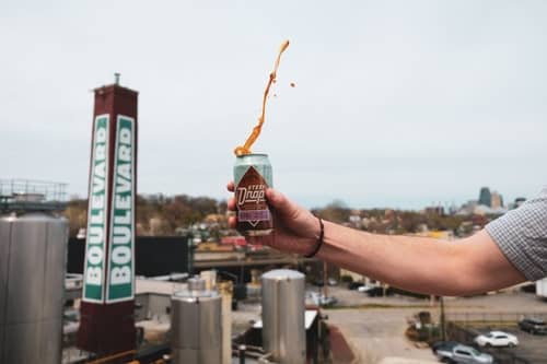 Cracking open a beer on a rooftop at the boulevard brewing company