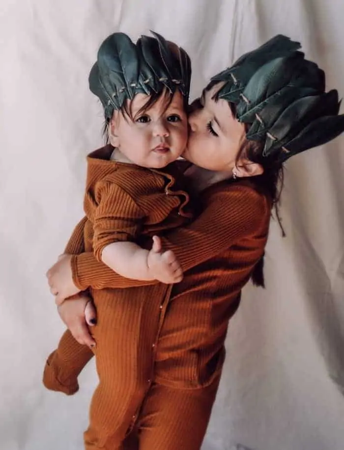children wearing leaf crowns