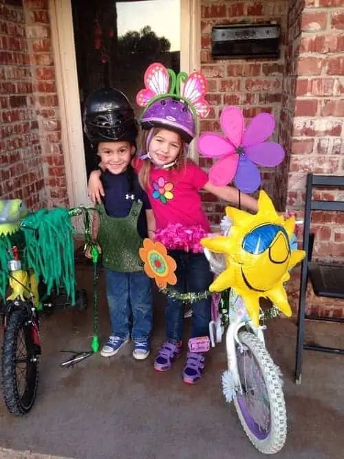 Kids about to ride their decorated bikes