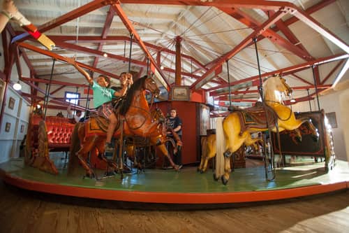 Kids catching rings at the Flying Horses Carousel in Martha's Vineyard