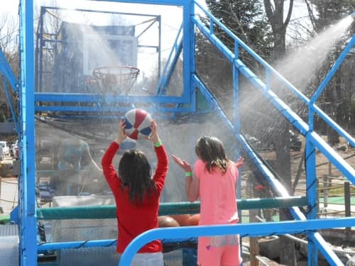 Kids shooting baskets at Chuckster's Family Fun Park