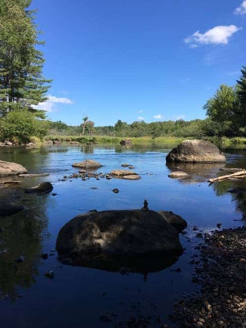 View of a pond at the WInnipesaukee River Trail in New England