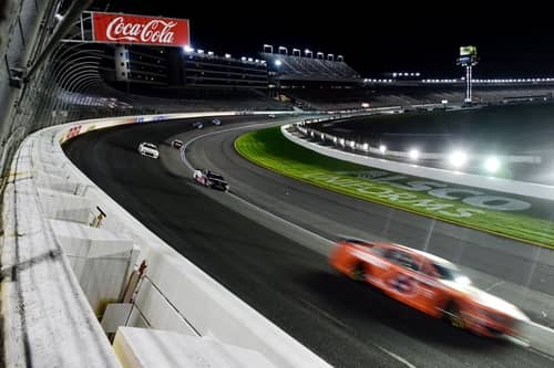 Cars racing at the Charlotte Motor Speedway near Concord, NC