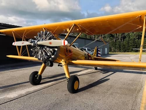 Plane waiting for riders at the Legacy Biplane Rides in Concord