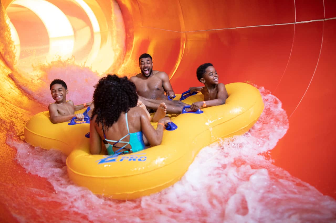 family enjoying a water ride