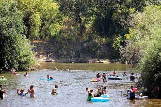 people swimming and training near manteca valley
