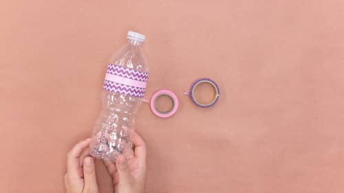 punching hole into bottle cap