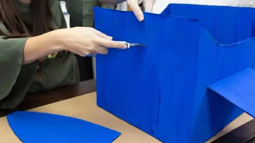cutting the box for the airplane