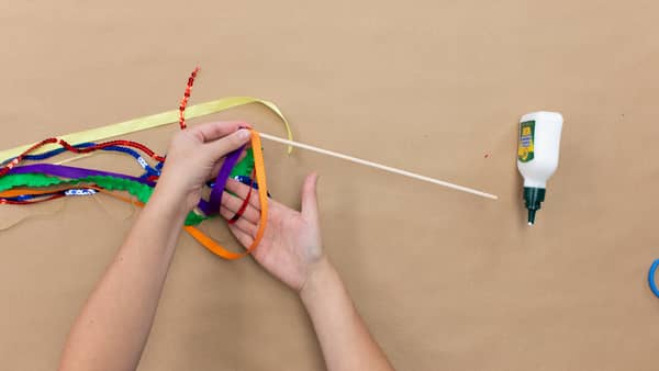 glue ribbon to wooden dowels