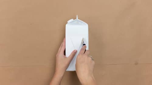 cut triangle into milk carton