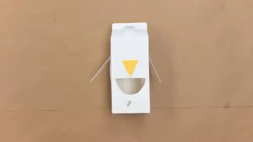 make triangle beak out of yellow construction paper and glue on milk carton