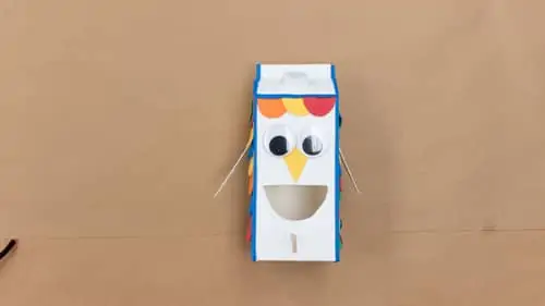 decorate milk carton with colored construction paper