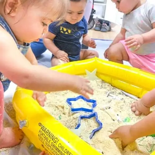 little kids love to play with moon sand