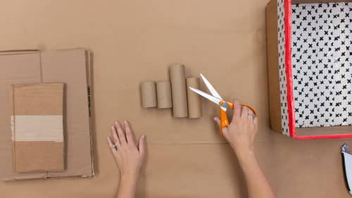 attach craft roll to cardboard box