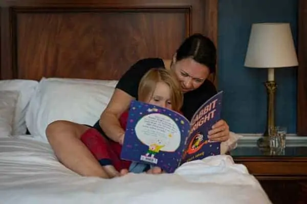 mother and daughter reading a story