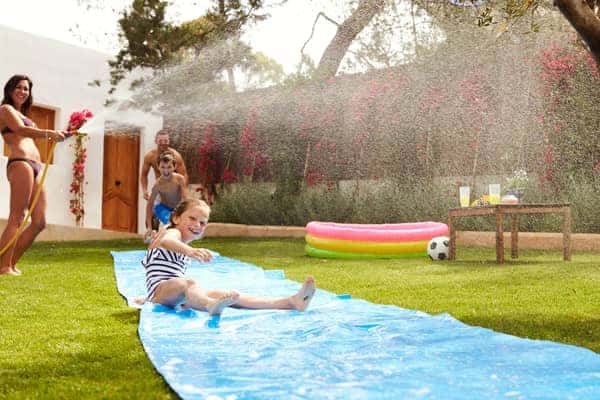 use water bottles, water balloons buckets, and other accessories to splash around in the backyard