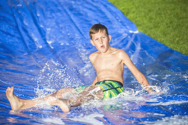 https://www.greatwolf.com/blog/wp-content/uploads/2021/05/water-park-tarp.jpg