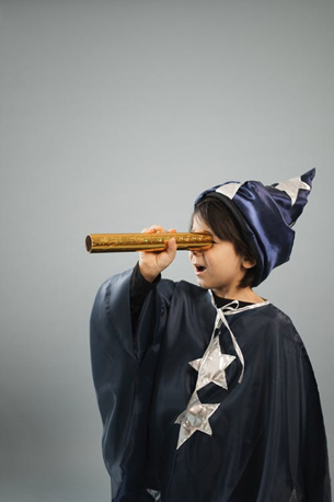 boy using a kaleidoscope