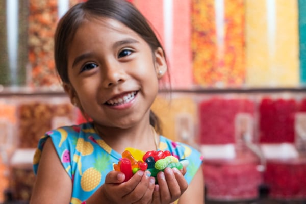 Happy Child at Candy Shop