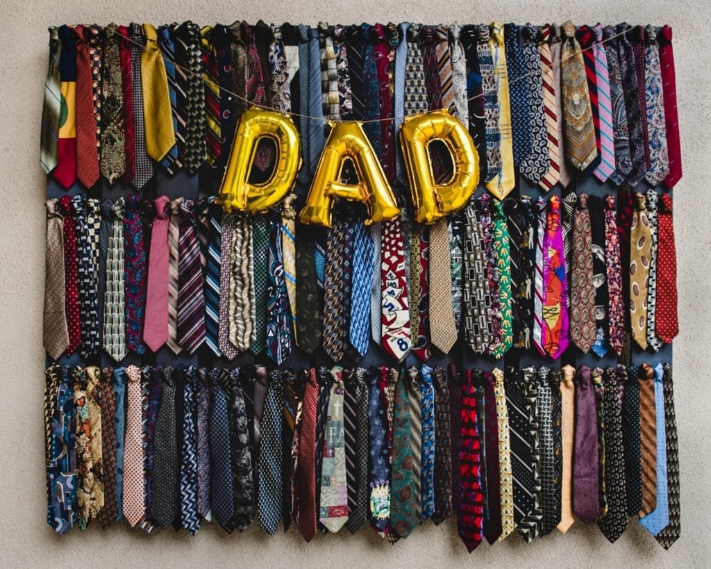 dad balloons infront of ties