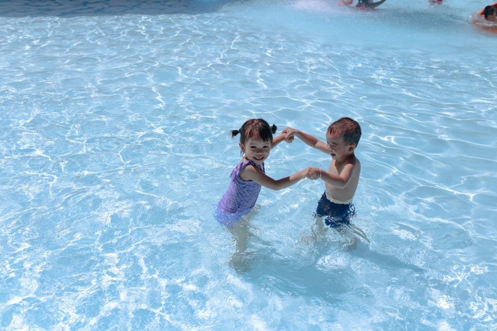 kids playing in the pool