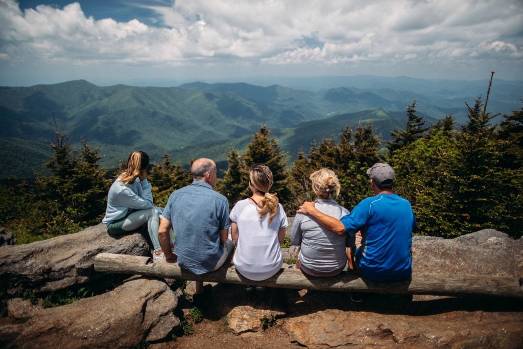 family looking at mountain view