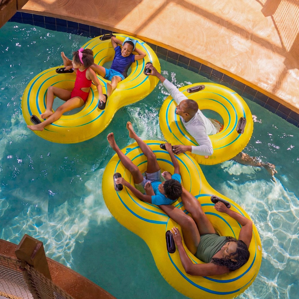 family enjoying on lazy river water ride
