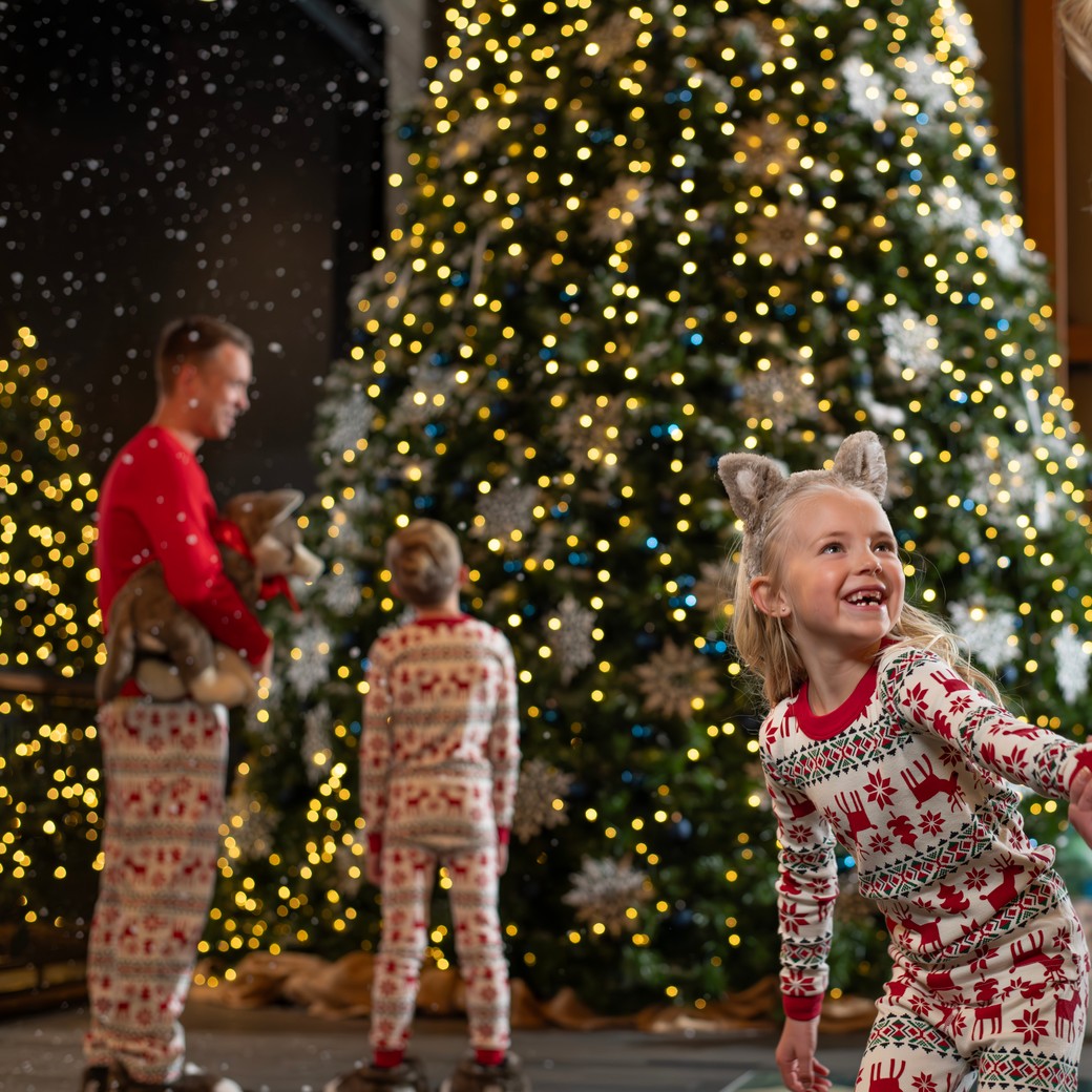 a mom and her son during a snowland scavenger hunt