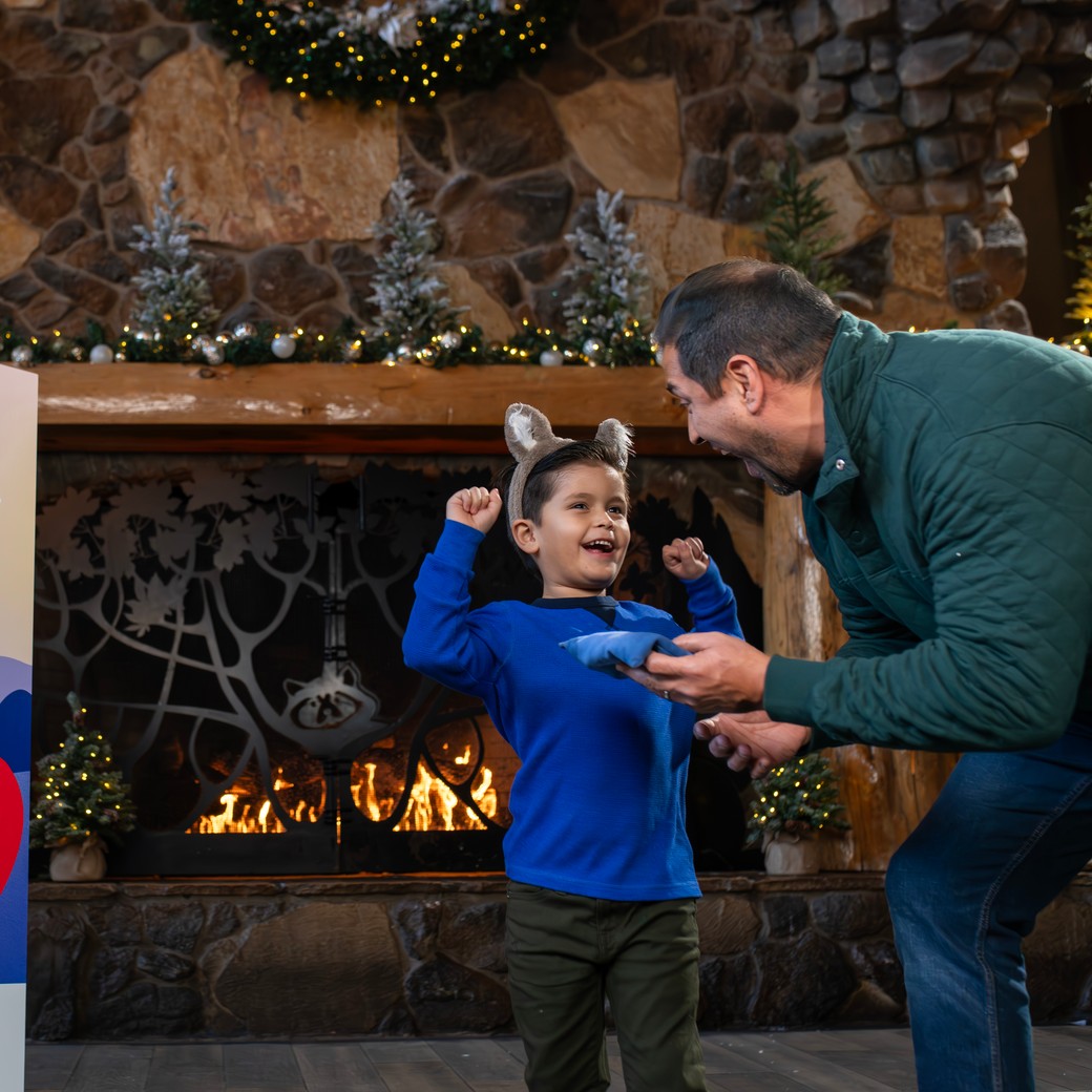 Father and son playing ring toss games