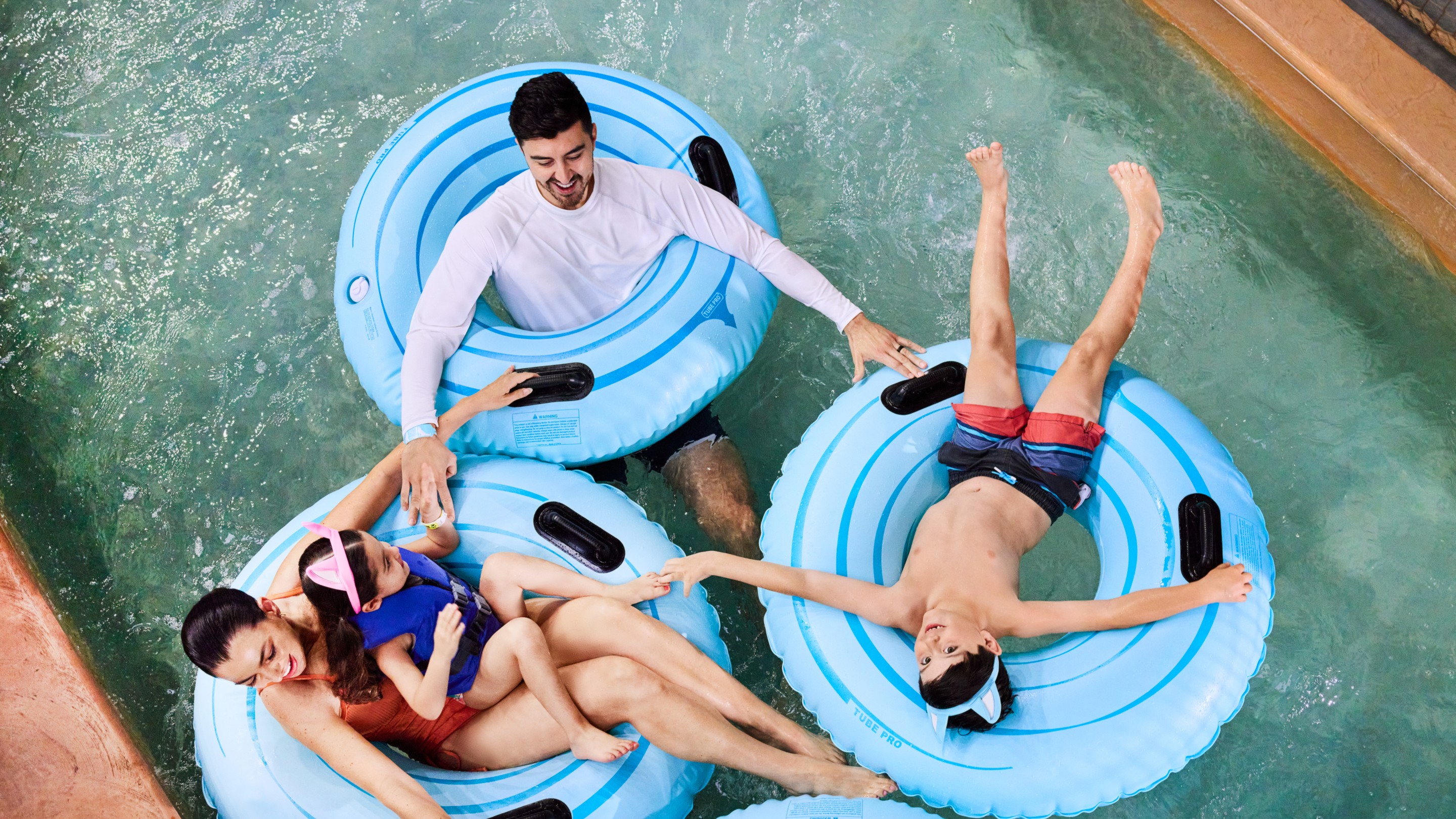 Family enjoying lazy river at Great Wolf Lodge