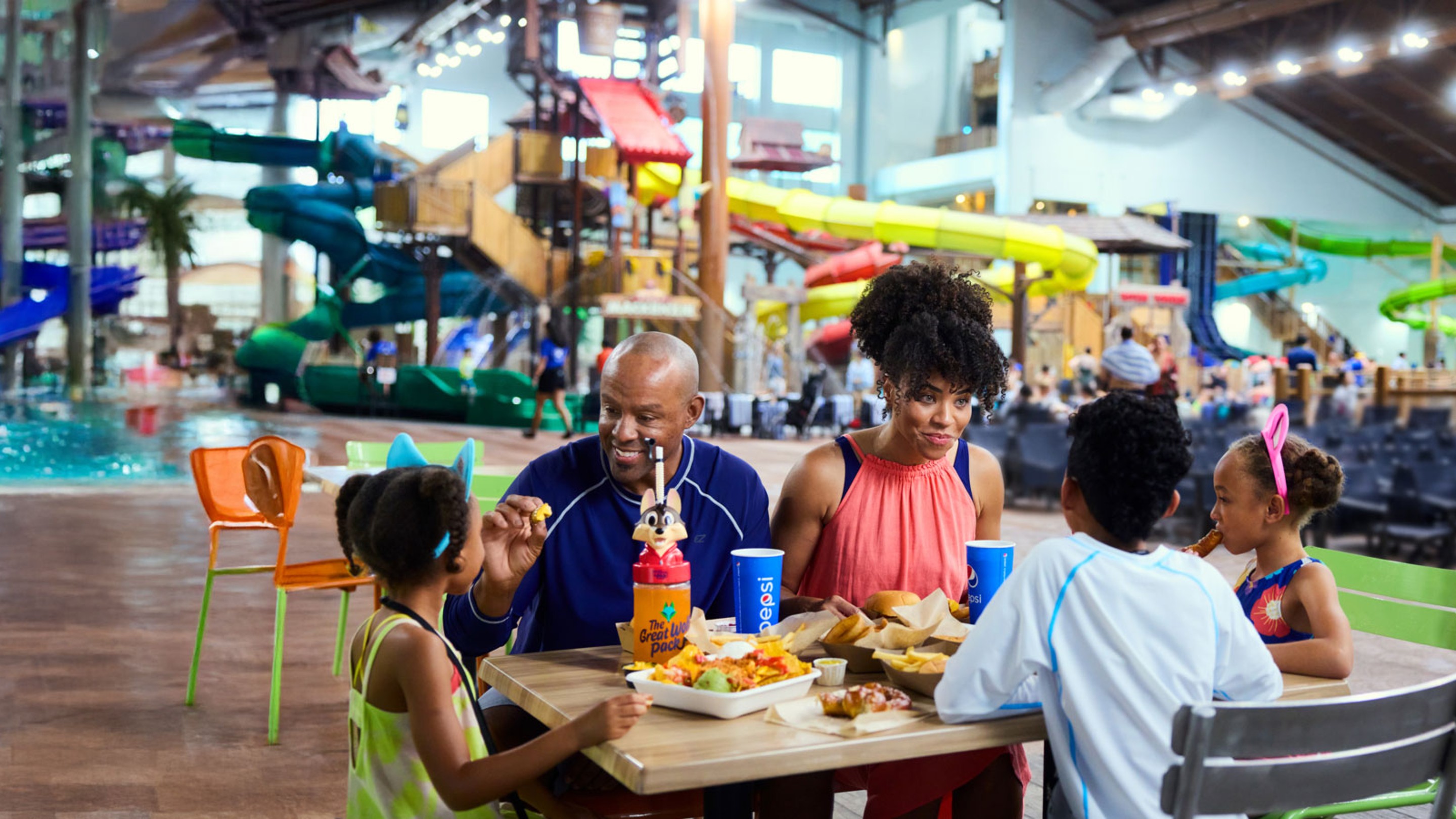 2 children enjoying their soda sipper from the Ultimate Food and Fun deal