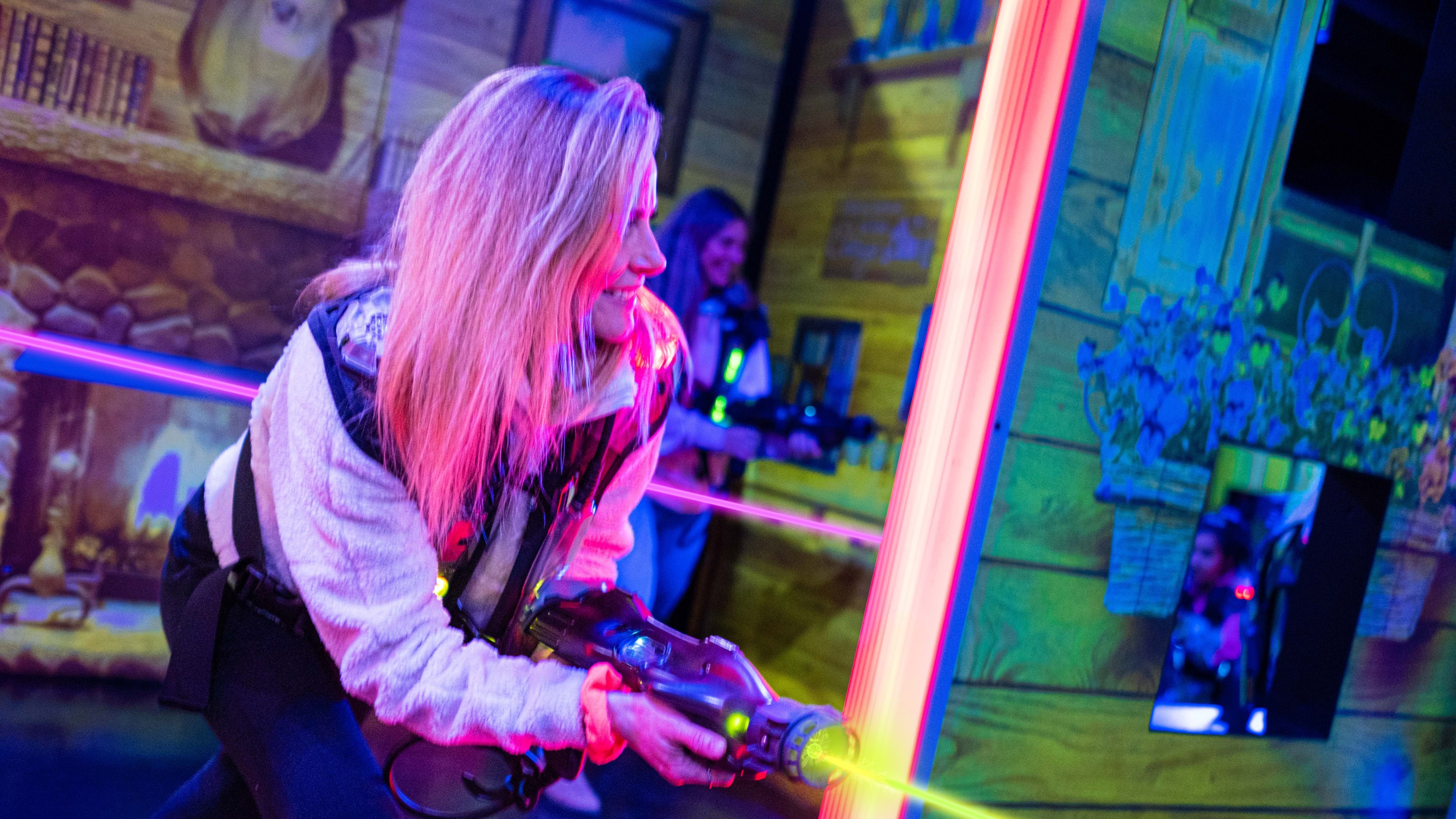 Family playing the game of Laser Tag