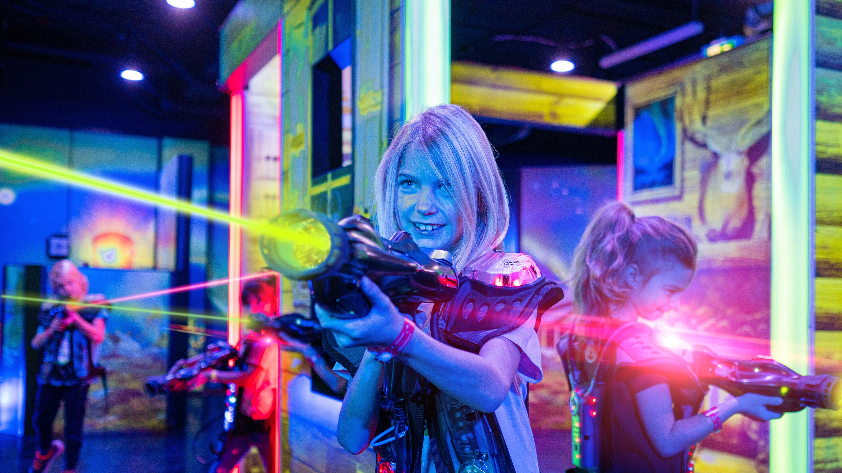 A boy holding a laser gun