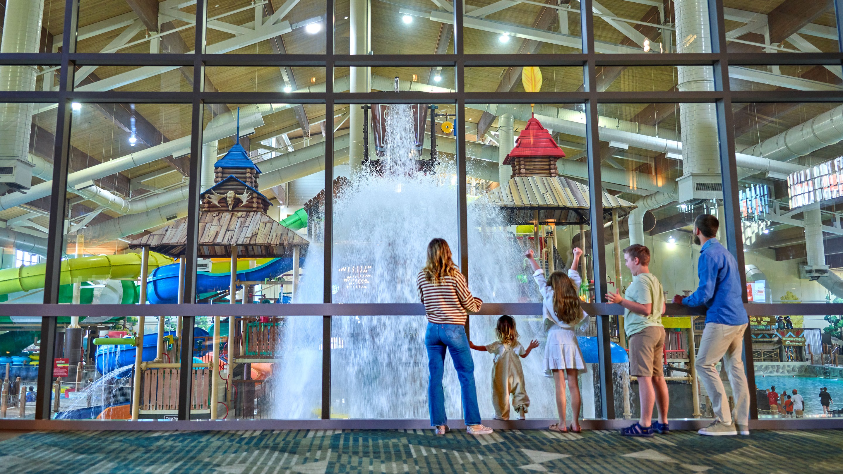 a family enjoying great wolf lodge events
