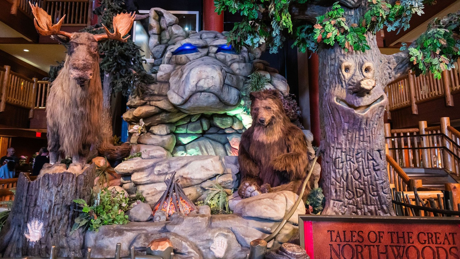 Children sit and watch the Great Clock Tower show