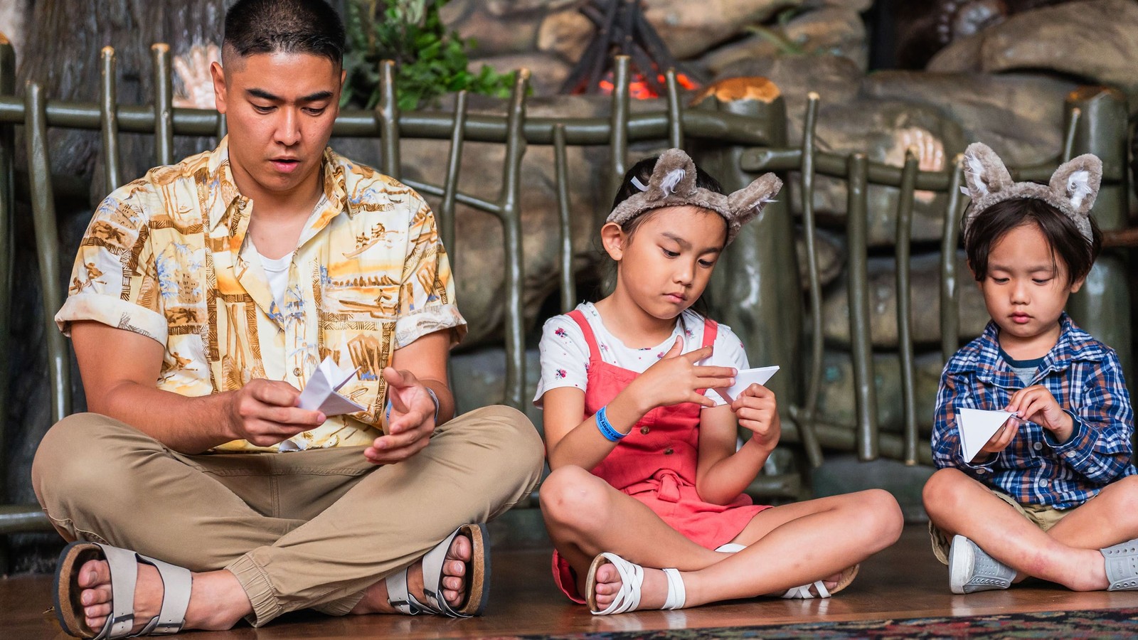 Father sitting with his children