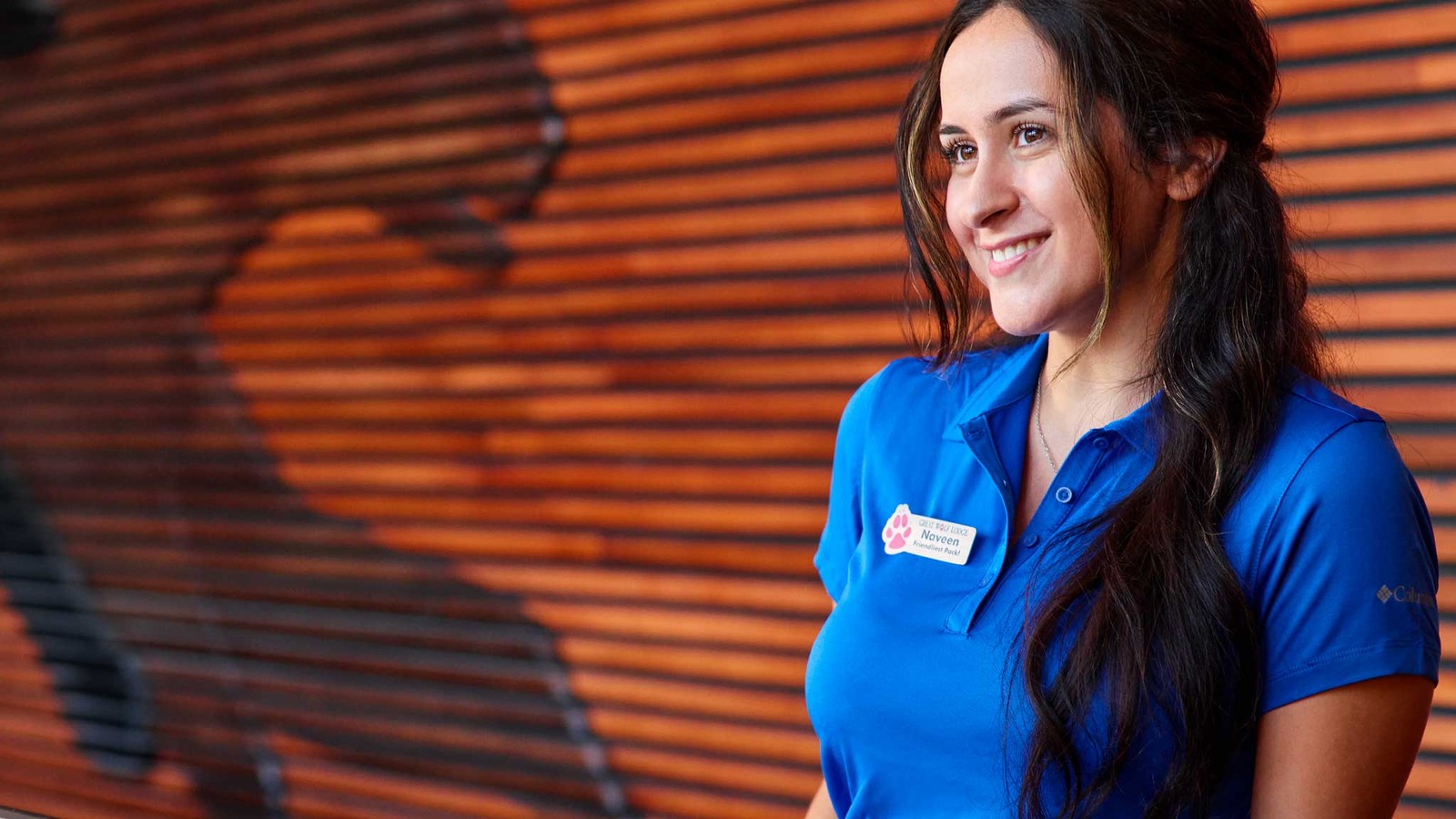 Staff member attending a guest at the reception