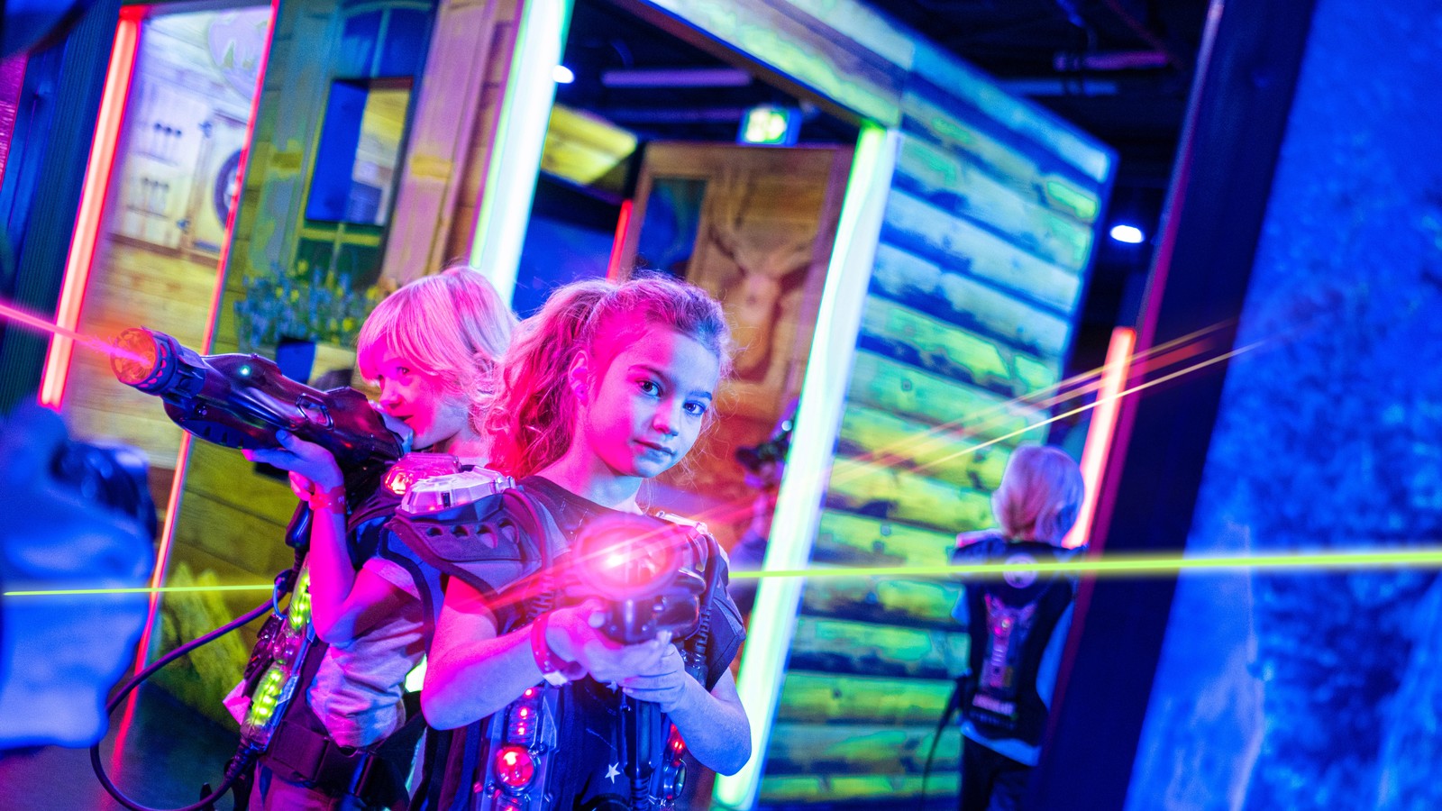 A boy holding a laser gun