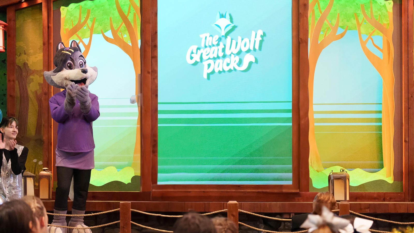 Children sit and watch the Great Wolf Pack Movie