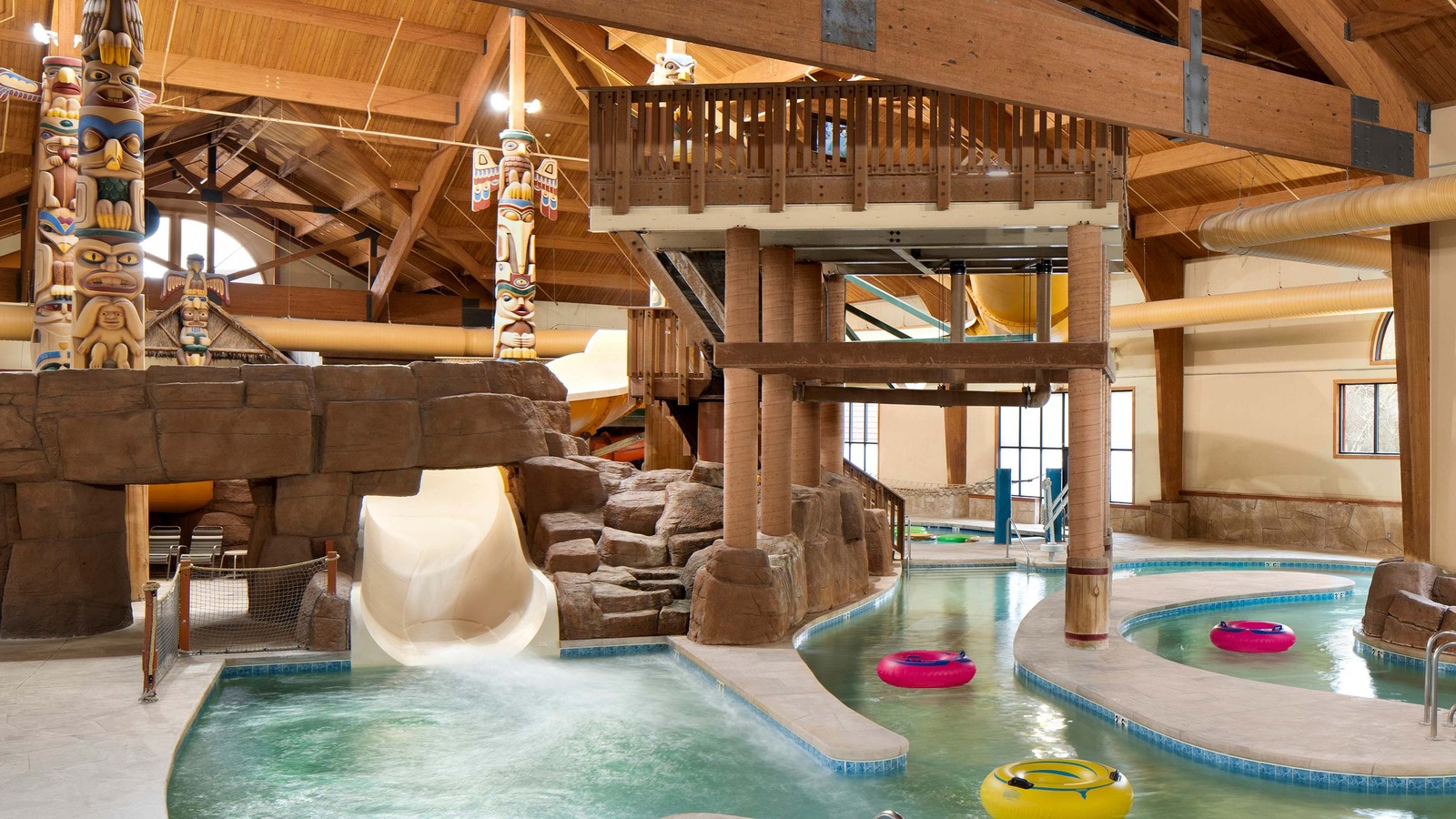 white body slide surrounded by rock décor