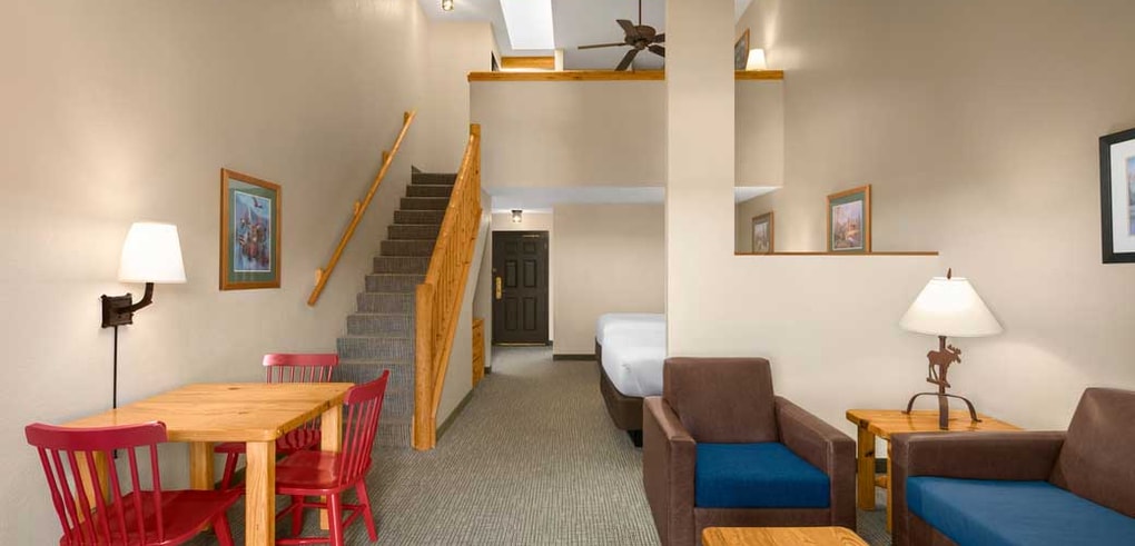 The stairs and living space in the Loft Fireplace Suite