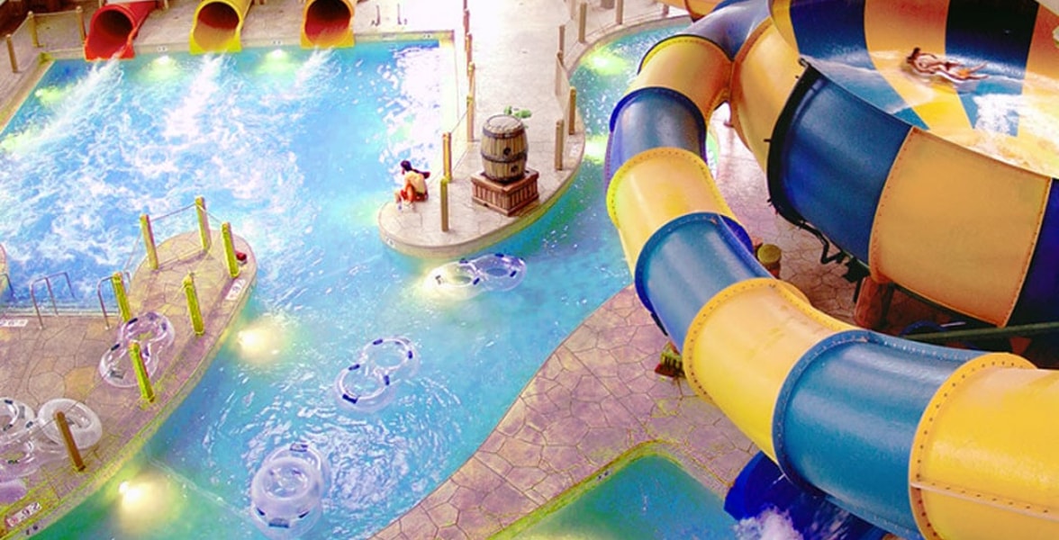An aerial view of the open waterslide and surrounding park 