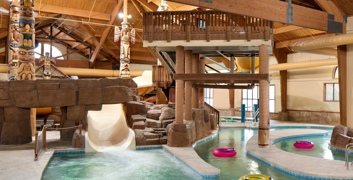 Body slide surrounded by rock decor