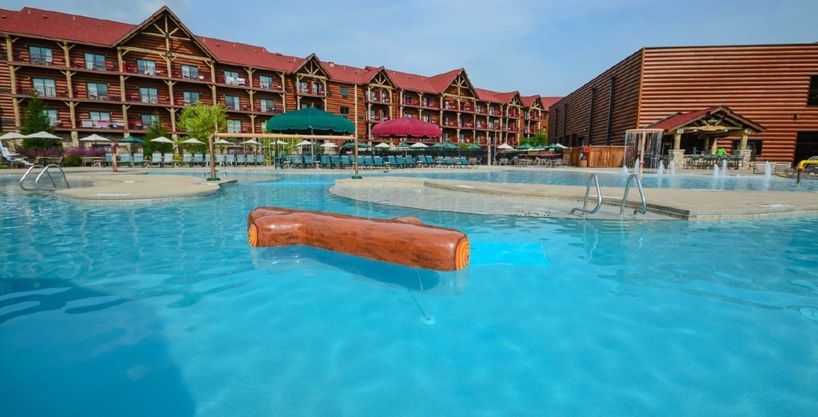 wood play structure in an outdoor pool