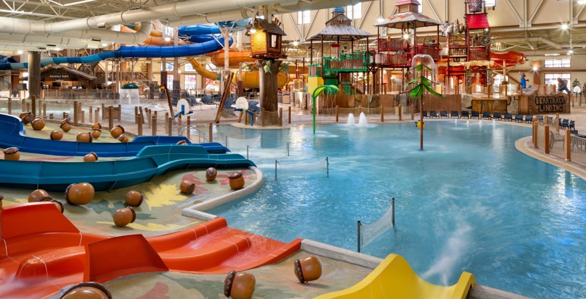 kid rides down waterslide