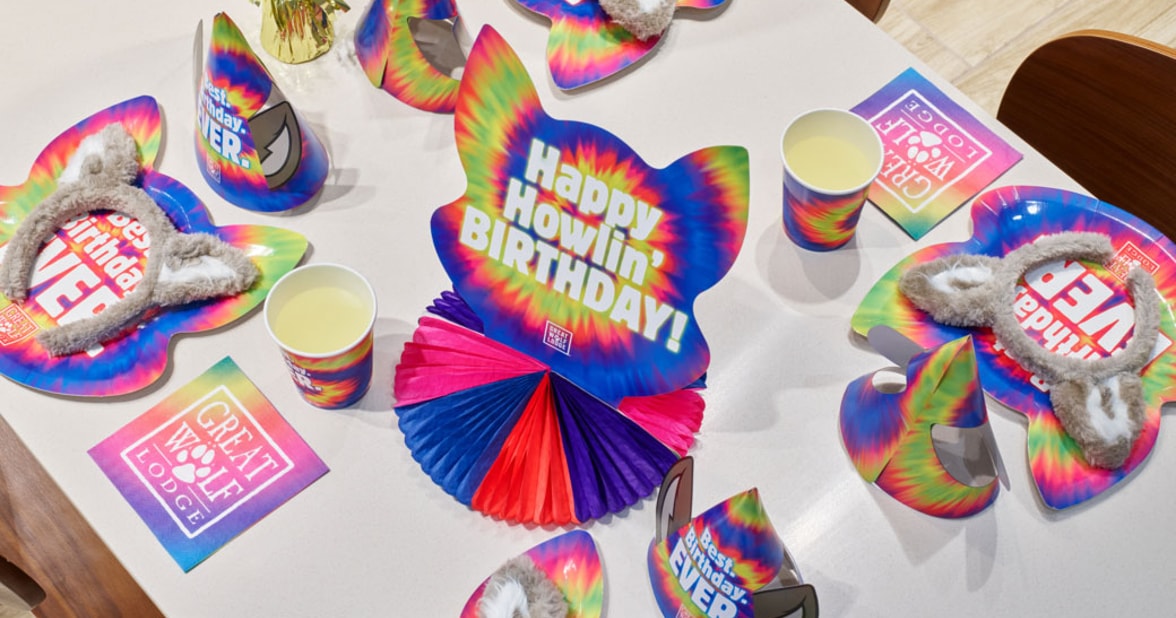 birthday cap on a table with decorations