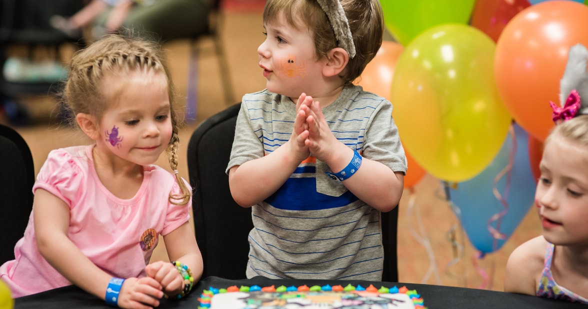 Wiley the wolf and a boy during a dance party