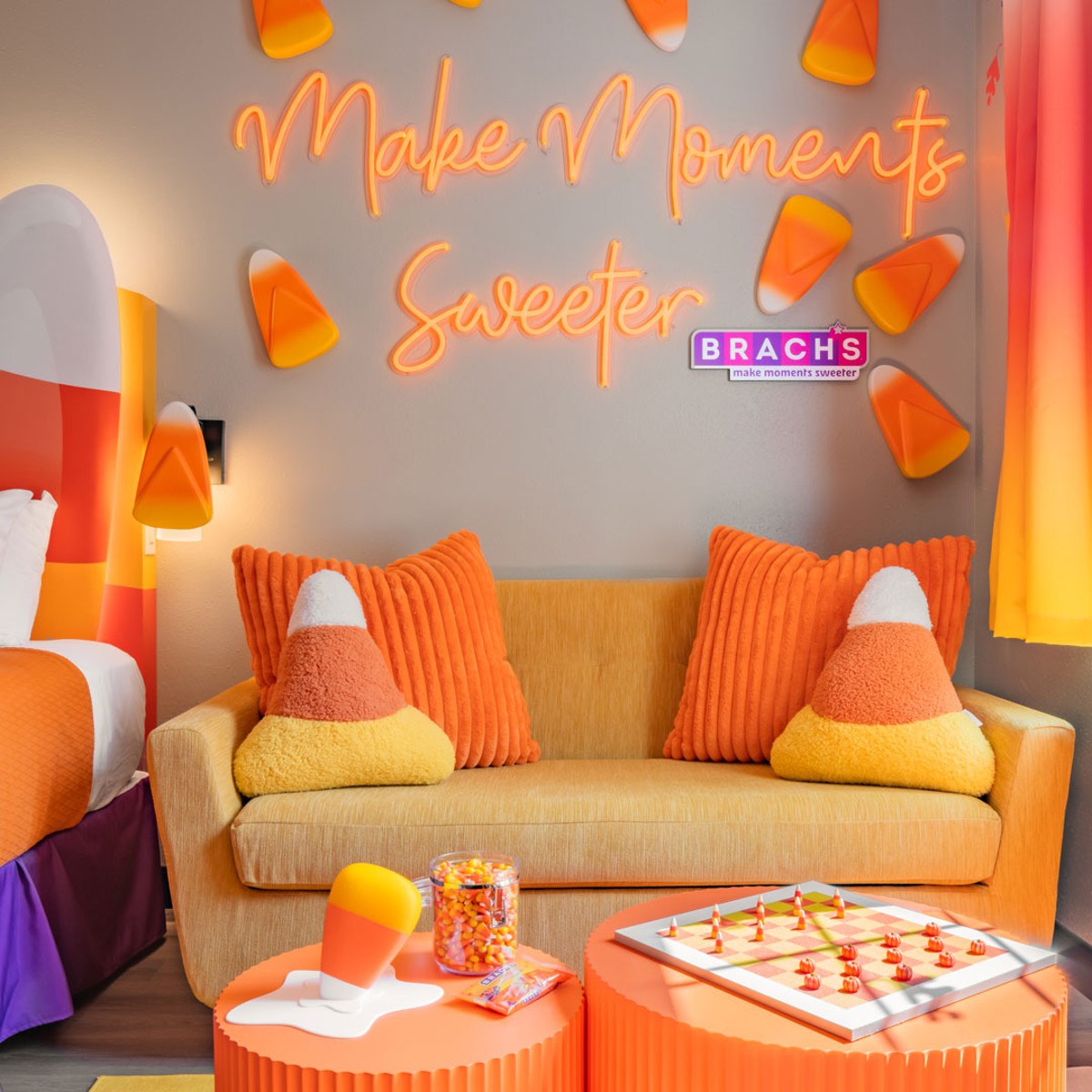 sofa and games in candy corn suite